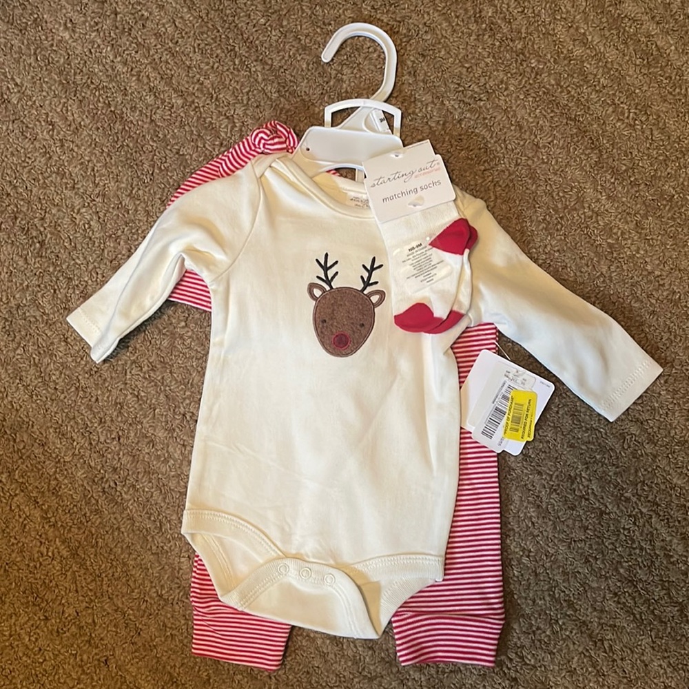 Starting out 4 piece set. New! Size 3 months. Socks, pants, onesie and cap